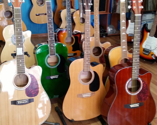 second hand acoustic guitar price